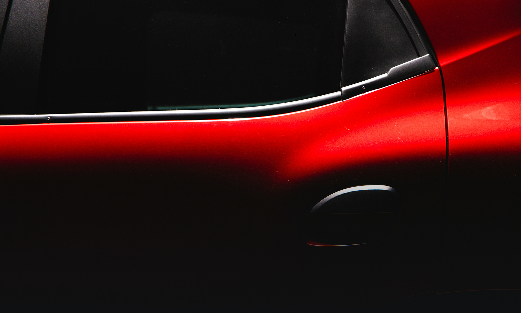 Close-up of a red automotive vehicle